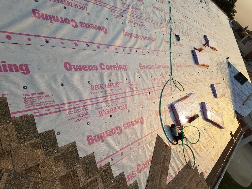 Slide of Oscar's Roofing