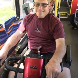 Alpine Home Medical - "The Boss"enjoying a ride on the bus with his loaner scooter. Thank you alpine medical.