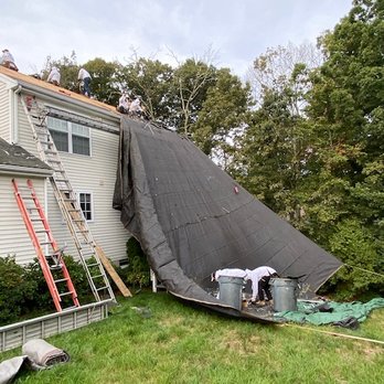 Trident Home Solutions - Protection from falling debris is very important. We take extreme caution not to harm your landscaping and your home. - Roofing Near Me - Wellesley, Massachusetts