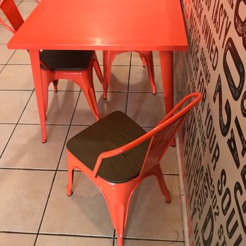 Tasties 302 - a table and chairs in a restaurant - Southern Near Me - Wilmington, Delaware Tasties 302 - a table and chairs in a restaurant - Southern Near Me - Wilmington, Delaware