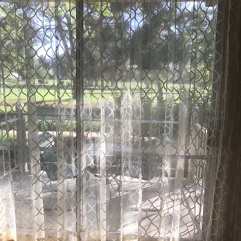 Pala Mesa Resort - View of golf course from our room with a small patio and sitting area. Through the sheer curtains. - Golf Near Me - Fallbrook, California Pala Mesa Resort - View of golf course from our room with a small patio and sitting area. Through the sheer curtains. - Golf Near Me - Fallbrook, California