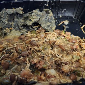 Uncle Julio's - In the middle of digging for chips. - Mexican Near Me - Spring, Texas