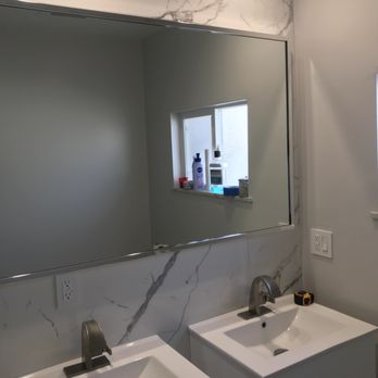John Man Construction - a bathroom sink and mirror - General Contractors Near Me - Glendale, California John Man Construction - a bathroom sink and mirror - General Contractors Near Me - Glendale, California
