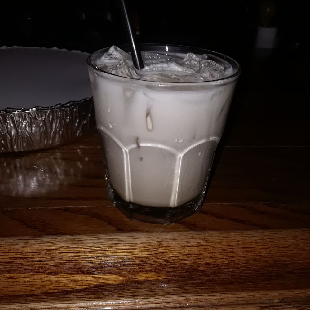 Hemingway's Watering Hole - a drink in a glass with a straw - Pubs Near Me - Waco, Texas Hemingway's Watering Hole - a drink in a glass with a straw - Pubs Near Me - Waco, Texas