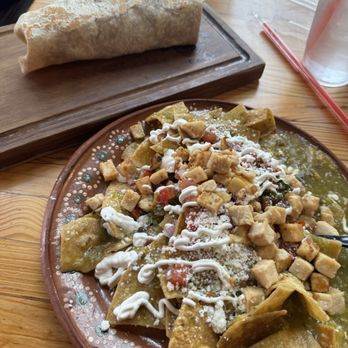 Con Azucar Cafe - Chilaquiles verdes with chicken and chilaquiles rojos burrito with chorizo and Eggs - Cafes Near Me - Omaha, Nebraska