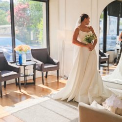 Bridal Galleria of Texas bride finding. her wedding dress.
