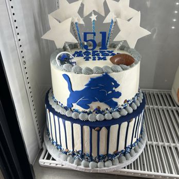 Café Sweets - Lions birthday cake (2 tier) - Desserts Near Me - Woodhaven, Michigan Café Sweets - Lions birthday cake (2 tier) - Desserts Near Me - Woodhaven, Michigan