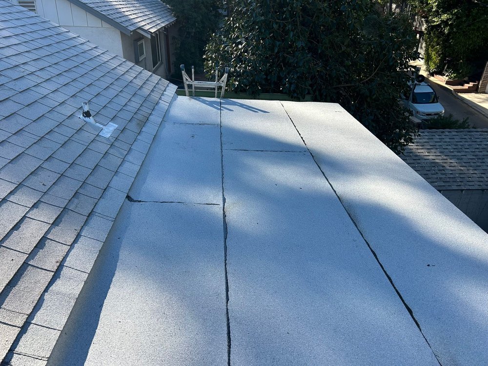 Slide of Anytime Roofing