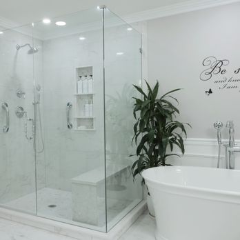 Kitchen & More - a bathtub and shower in a bathroom - Kitchen & Bath Near Me - Bellevue, Washington Kitchen & More - a bathtub and shower in a bathroom - Kitchen & Bath Near Me - Bellevue, Washington