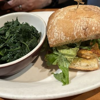 Lumberyard - Halibut sandwich (with spinach by mistake but they corrected it with what was ordered - sweet potato fries) - New American Near Me - Laguna Beach, California