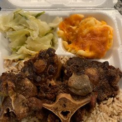 kreole kitchen - Oxtails Mac n cheese white rice and cabbage