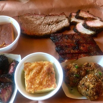 Tejas Chocolate Craftory - Left to right, top to bottom: carrot soufflé, brisket, pork belly, pork ribs, burnt ends, cornbread casserole, boudin balls - Chocolatiers & Shops Near Me - Tomball, Texas