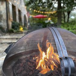 Chanticleer Inn Bed and Breakfast - Outside fireplace for guests
