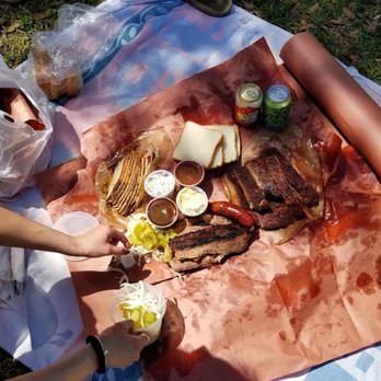 Franklin Barbecue - We made a picnic out of it - 5 lbs of meat: turkey, sausage, pork ribs, brisket. And all the trimmings - Barbeque Near Me - Austin, Texas Franklin Barbecue - We made a picnic out of it - 5 lbs of meat: turkey, sausage, pork ribs, brisket. And all the trimmings - Barbeque Near Me - Austin, Texas
