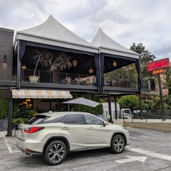 Westside Provisions District - Outside. Little Sparrow storefront. Valet parking. Valet starts at $10 for up to 4 hours. Self-parking starts at $5.10 for 2 hours.