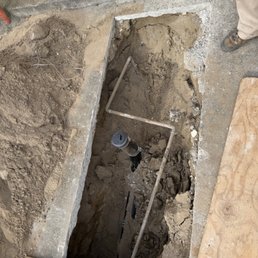 Part of the driveway that had to have concrete removed to gain access to the pipes.