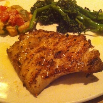 Bonefish Grill - Chilean sea bass with lemon butter sauce and grilled broccolini. - Seafood Near Me - Plantation, Florida