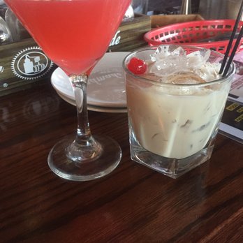 Bourbon & Brews - (Left) bloodless cosmo (right) White Russian - Beer Bar Near Me - Merrick, New York
