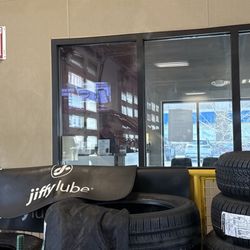 Jiffy Lube - Window to front desk. We opted to stay in car, but can see the inside and it looks clean and cozy too.