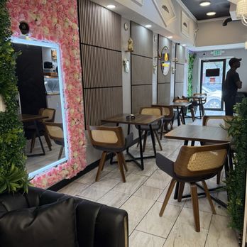 Ruya Cafe - View from casual seating area to the door. - Coffee & Tea Near Me - Baltimore, Maryland