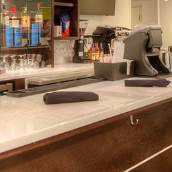 Holiday Inn - Unwind and Enjoy a delicious cocktail and appetizer at the Holiday Pub lounge.