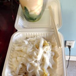 Wet seafood stir fry rice noodle