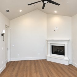 Rays Carpet One Floor & Home - Opulux laminate in Aurora in the primary bedroom, new build in Escalon.