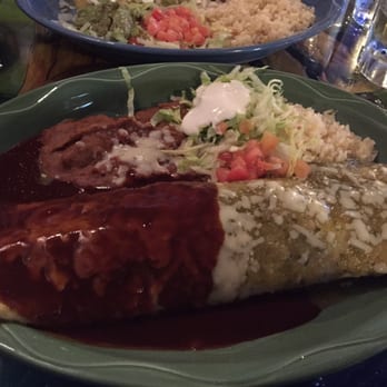 Casa Real - Pork enchilada with both red and green sauce - Mexican Near Me - Madison Heights, Michigan
