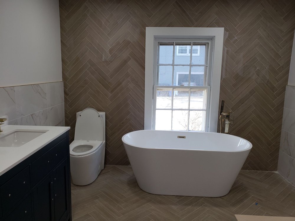 Slide of Tiulux Plumbing