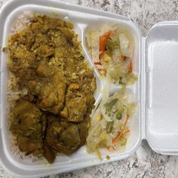 Caribbean Queen - Curry goat plate. Ate the jerk chicken before getting a picture.