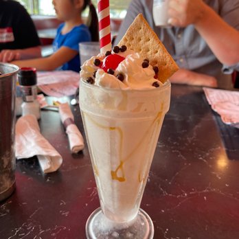 Silver Diner - a milkshake with whipped cream, chocolate chips, and cherries - Diners Near Me - Reston, Virginia Silver Diner - a milkshake with whipped cream, chocolate chips, and cherries - Diners Near Me - Reston, Virginia