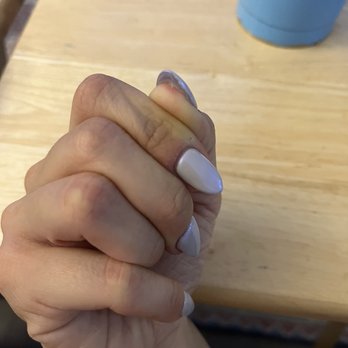 Rika nail salon - uv gel glue was so flooded under both thumbs that it burned my skin - when i told the nail tech, she said "ok" - Nail Salons Near Me - Brooklyn, New York