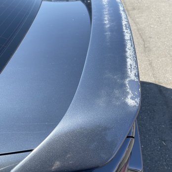 Precision Collision Center - Old paint chipping on spoiler - Auto Repair Near Me Precision Collision Center - Old paint chipping on spoiler - Auto Repair Near Me