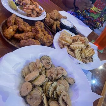 Hooters - Fried Pickles, waffle fries, steamed shrimp, 20 piece Original Wings (10 spicy garlic and 10 plain w/ hot sauce on the side) - Sports Bars Near Me - Rohnert Park, California
