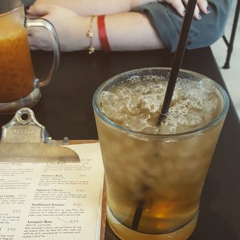KrungThep Tea Time - Lychee Peach iced tea with honey ($3.75), the other drink is the Thai milk tea. - Tea Rooms Near Me - Winter Park, Florida