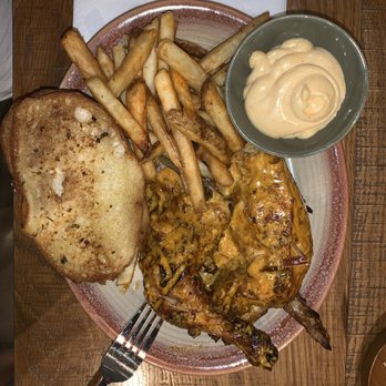 Nando's Peri-Peri - Hot marinade Half-Chicken combo with garlic bread and chips with the Perinaise sauce - South African Near Me - Fairfax, Virginia Nando's Peri-Peri - Hot marinade Half-Chicken combo with garlic bread and chips with the Perinaise sauce - South African Near Me - Fairfax, Virginia