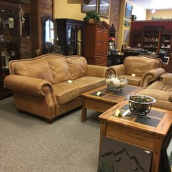 Home Sweet Home Consignment - Leather nail head sofa & matching oversized chair.