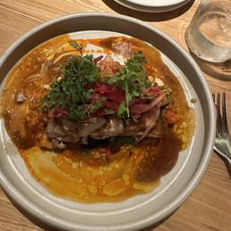 Wish I took picture of menu. This is pork filet over vegetables Wish I took picture of menu. This is pork filet over vegetables