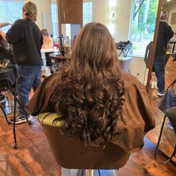 Woman's Haircut & Blow Dry Woman's Haircut & Blow Dry