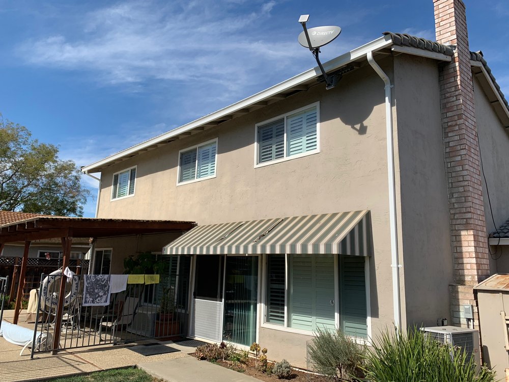 Slide of Signature Rain Gutters & Metal Works