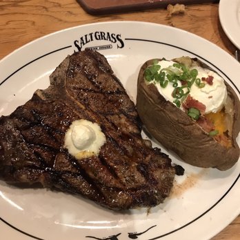 Saltgrass Steak House - T-bone steak and baked potato. - Steakhouses Near Me - Houston, Texas Saltgrass Steak House - T-bone steak and baked potato. - Steakhouses Near Me - Houston, Texas