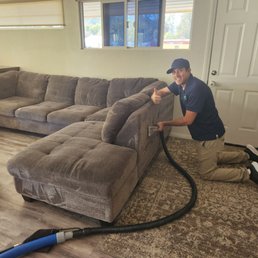 Hard at work steam cleaning the couch!! Thanks Bryan!