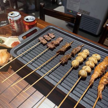 Midnight Skewer - From left to right; Wagyu skewer, beef tongue skewer, quail eggs, prawn skewers. - Chinese Near Me - San Diego, California Midnight Skewer - From left to right; Wagyu skewer, beef tongue skewer, quail eggs, prawn skewers. - Chinese Near Me - San Diego, California
