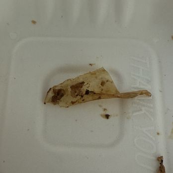 Jaggers - What I assume is parchment paper in one of the burgers. - American Near Me - Fayetteville, North Carolina