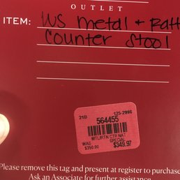 Chair tag showing a markdown of THREE CENTS.