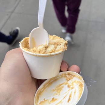 Magnolia Bakery - a hand holding a cup of ice cream - Bakeries Near Me - New York, New York Magnolia Bakery - a hand holding a cup of ice cream - Bakeries Near Me - New York, New York