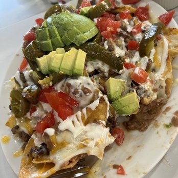 El Yahualica Tacos - Nachos Comes with cheese, beans, tomato, avocado, jalapeño. Have to ask for meat. - Mexican Near Me - Concord, California El Yahualica Tacos - Nachos Comes with cheese, beans, tomato, avocado, jalapeño. Have to ask for meat. - Mexican Near Me - Concord, California