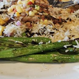 Mahi Mahi with mango pineapple salsa, jasmine rice and grilled asparagus. Mahi Mahi with mango pineapple salsa, jasmine rice and grilled asparagus.