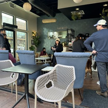 La Reunion - a group of people sitting at tables in a coffee shop - Bars Near Me - Dallas, Texas La Reunion - a group of people sitting at tables in a coffee shop - Bars Near Me - Dallas, Texas