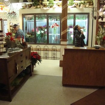 Shaw Florists - Big flower cooler and front tables. - Florists Near Me - Grand Rapids, Minnesota